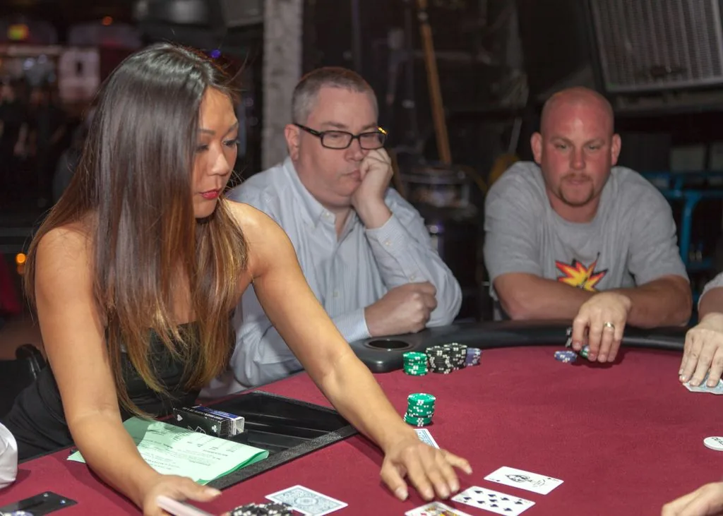 Professional dealers running casino tables at a private party
