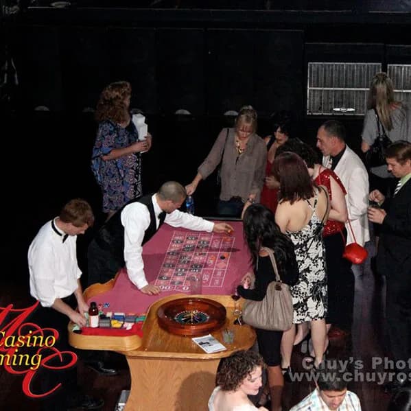 Roulette wheel and table set up for a casino night rental